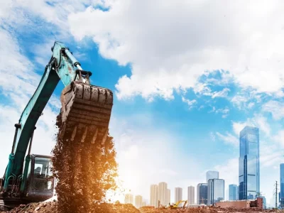 retroexcavadora sol cielo construcción